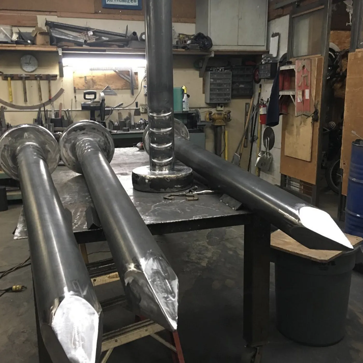 Steel posts being fabricated in Mario's metal shop